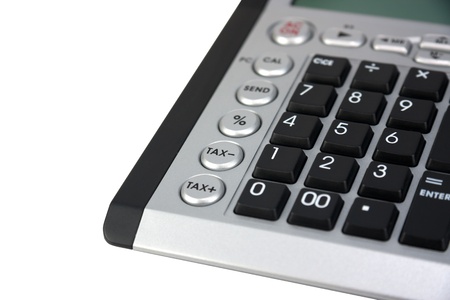 Part of an electronic calculator over whiteの写真素材