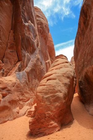 Vertical shot of a trail through Arches National Parkの写真素材