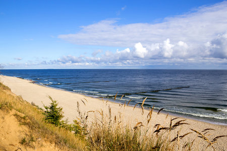 Horizontal shot of an empty beach at the Baltic Sea in morning lightの写真素材