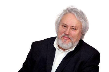Grey haired senior wearing a dark suitの写真素材