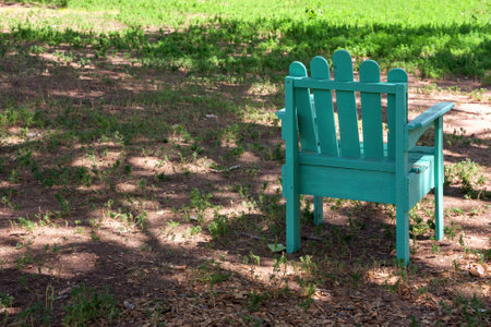 One deck chair in the shadow during a sunny dayの写真素材