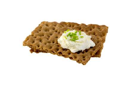 Crispbread with cream cheese and minced chivesの写真素材