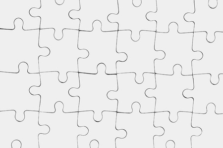 Black drawn lines making a completed puzzle showing from aboveの写真素材