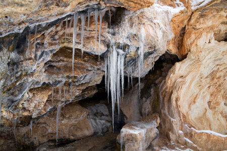 Icicles on rocks at a spring at Jemez River New Mexicoの写真素材