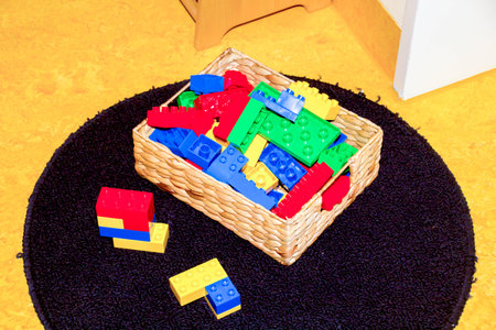 Plastic toys in box a childrens room ready to play withの写真素材
