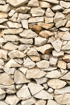 Illustration of a stack of beige partly cut marble rocksの写真素材