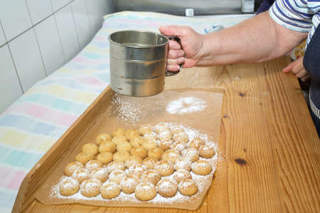 Preparing and baking cookies for holiday seasonの写真素材