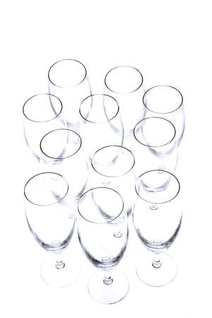 Empty champagne glasses from above on white backgroundの写真素材