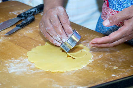 Preparing and baking cookies for holiday seasonの写真素材