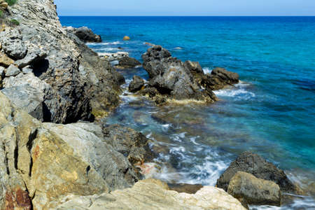 Long time exposure of surf at Elba rocky coastの写真素材