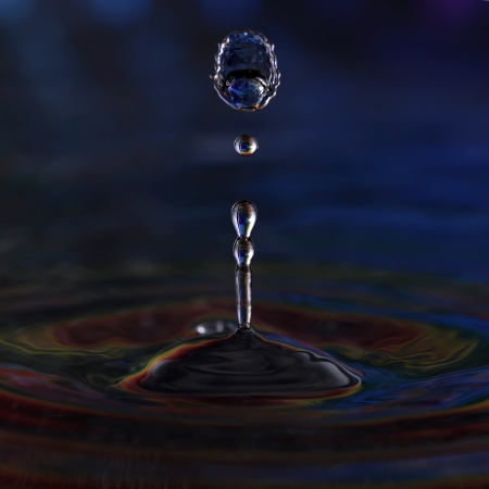Photo of falling water droplet collisionの写真素材