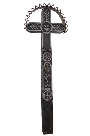 Photo of the old hand-carved and painted wooden crucifix isolated on a white background. This type of cross is typical for the region Detva Slovakiaの写真素材
