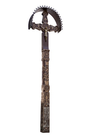 Photo of the old hand-carved and painted wooden crucifix isolated on a white background. This type of cross is typical for the region Detva Slovakiaの写真素材