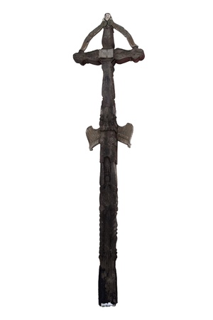 Photo of the old hand-carved and painted wooden crucifix isolated on a white background. This type of cross is typical for the region Detva Slovakiaの写真素材