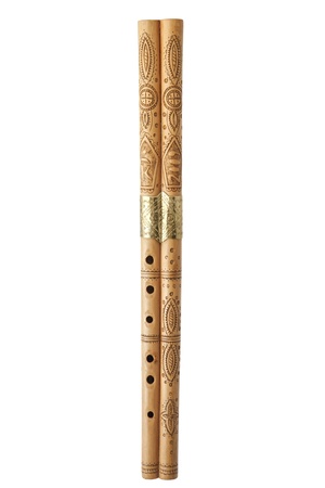 Wooden folk music instrument. Hand carved on a white background. It is used today in the folk customs.の写真素材