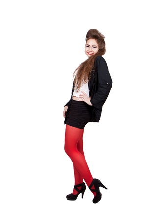 Teenage girl in black and red clothes, isolated on white backgroundの写真素材