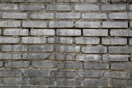 Brick wall with regular texture grayの写真素材