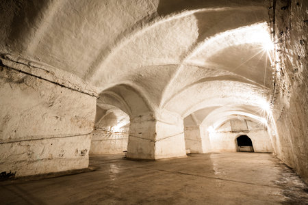 an old abandoned limestone mine corridors, poor light