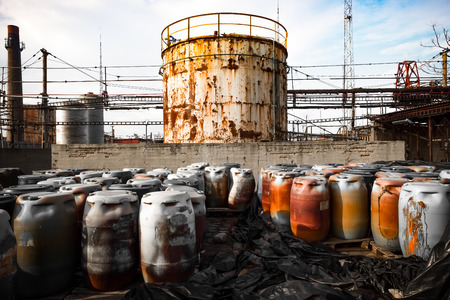 barrel containing much hazardous waste in a firmの写真素材