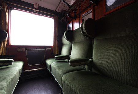 old train cabin interior with green armchairのeditorial素材