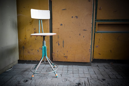 old blue iron chairs, an abandoned factory