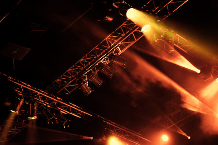 Stage lights on a console, smoke