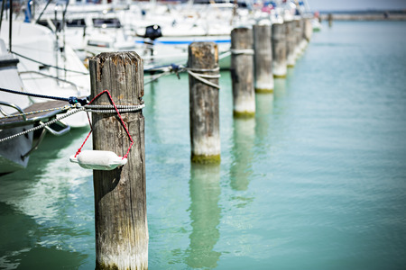 sailing boat ships stand in a line in a harbourの写真素材