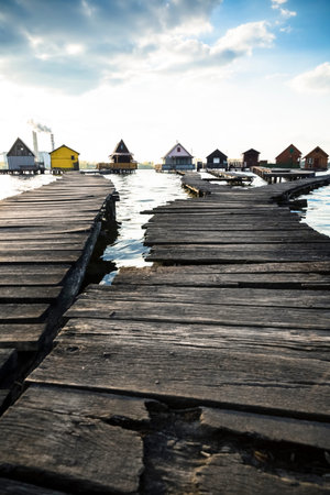 cottages on the shore of a lakeの写真素材