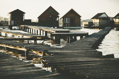 cottages on the shore of a lakeの写真素材