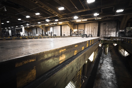 the dirty oily bus garage inspection pitのeditorial素材