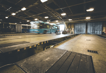 the dirty oily bus garage inspection pitのeditorial素材