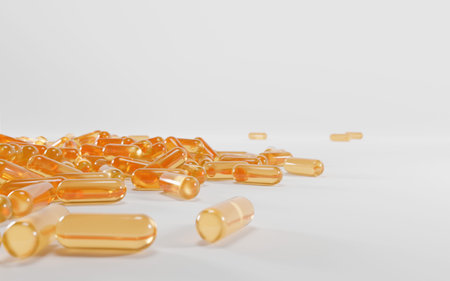Golden transparent capsules of vitamin A, E, Omega 3 or collagen essence, serum. Medical pill with...
