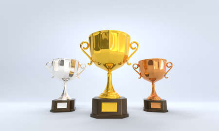 Golden, silver and bronze cup, award trophy or winner prize on wooden pedestal with empty gold plate for championship. Shiny metal goblets with bowls isolated on grey background, realistic 3d setの写真素材