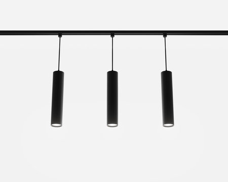 Track lighting system, pendant ceiling spot lamps 3d render. Modern black metal long tubes, accent light for exhibition hall, cafe or office interior isolated on white backgroundの写真素材