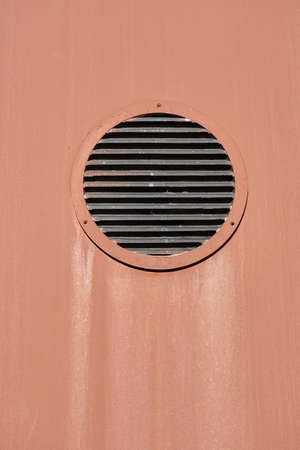 The ventilation hole on the brown-colored wall with space for text ..の写真素材
