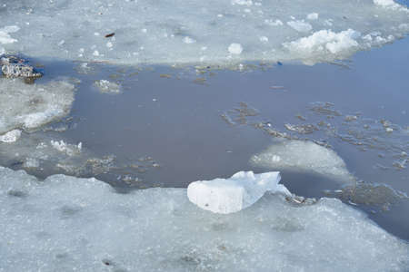 Melting ice on the river in the spring.の写真素材