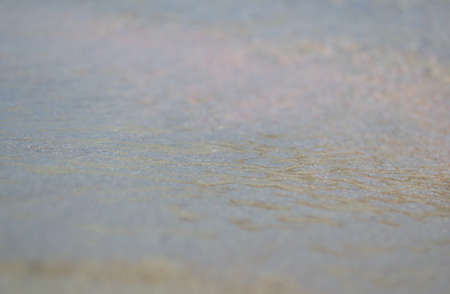 Abstract background of the water surface on the sea beach.の写真素材