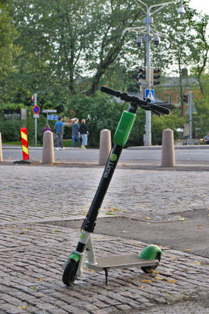 Turku, Finland - August 08, 2021: Electric scooter rental company Lime on the street.のeditorial素材
