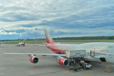 St. Petersburg, Russia, august 8, 2021: Preparation and refueling of the Rossiya airlines aircraft before the flight.のeditorial素材