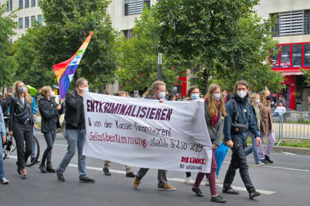 Berlin, Germany - September 18, 2021: Crowd of people with placards and flags go to the demonstrationのeditorial素材