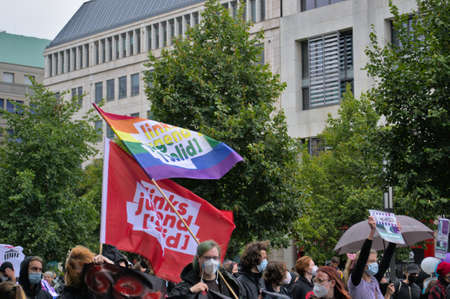 Berlin, Germany - September 18, 2021: Crowd of people with placards and flags go to the demonstrationのeditorial素材