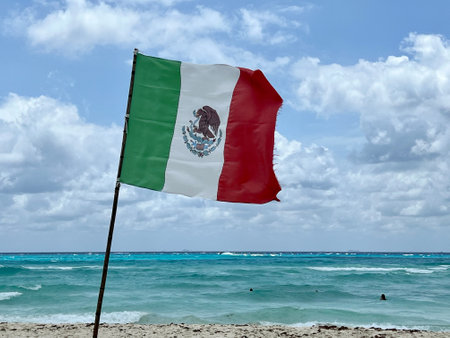 Mexican flag on a flagpoleの写真素材
