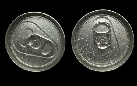 Top of two cans isolated on black backgroundの写真素材