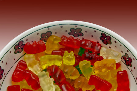 Group of color jellybean inside a pot.の写真素材
