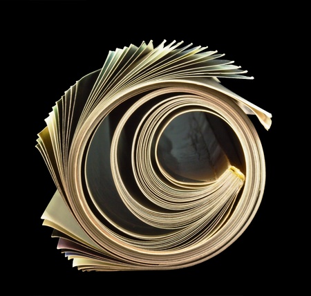 Magazine rolled in macro detail of pagesの写真素材