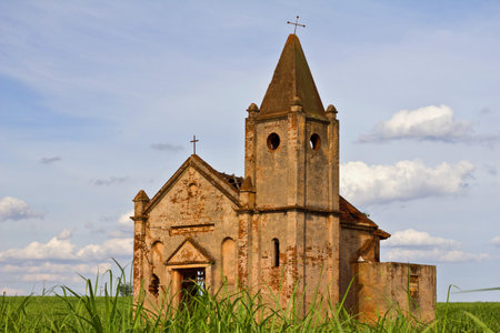 Ruins of an abandoned church in the field