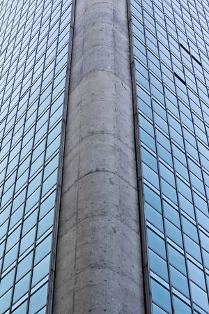 Modern building with glass facade in blueの写真素材