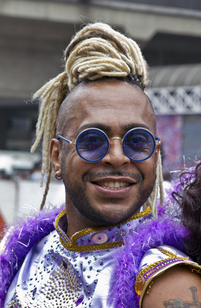 SAO PAULO, BRAZIL - June 7, 2015: An unidentified man  wearing costume and celebrating lesbian, gay, bisexual, and transgender culture in the 19Âº Pride Parade Sao Paulo.のeditorial素材