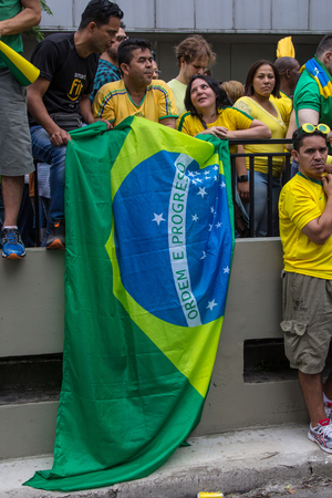 Sao Paulo Brazil March 13, 2016: One unidentified girl in the biggest protest against federal government corruption in Sao Paulo.のeditorial素材