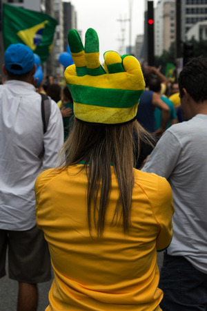 Sao Paulo Brazil March 13, 2016: One unidentified girl in the biggest protest against federal government corruption in Sao Paulo.のeditorial素材